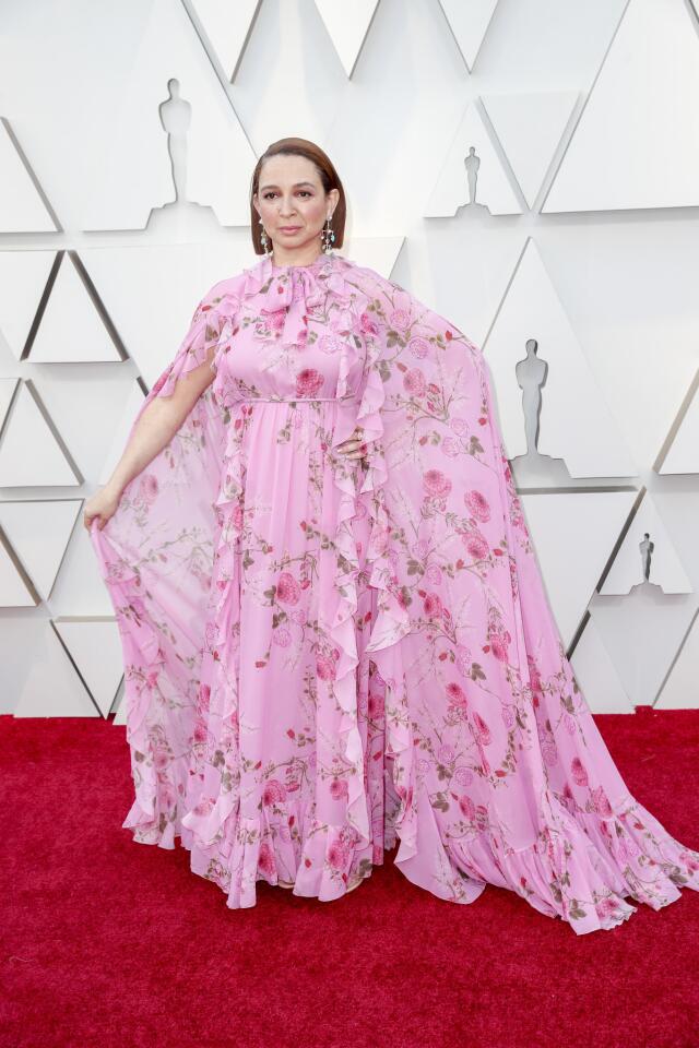 MISS: Maya Rudolph gives us an overdose of flower power in a pink floral gown by Giambattista Valli.