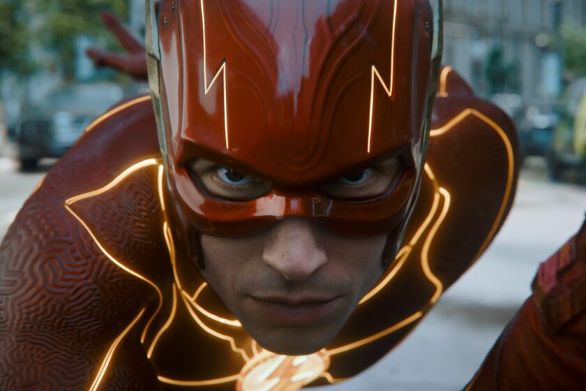 Ezra Miller in costume as the Flash