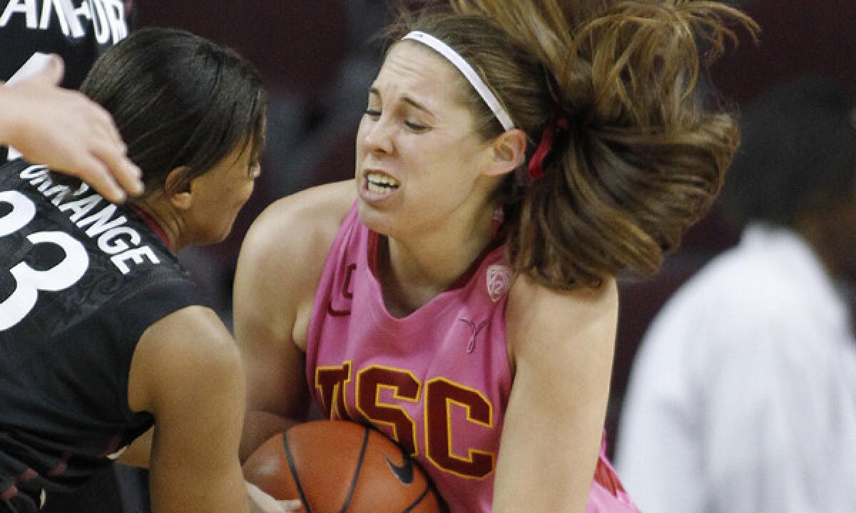 USC foward Cassie Harberts, right, battles Stanford guard Amber Orrange for the ball during a game Feb. 21. Harberts was named an All-Pac-12 selection Tuesday.