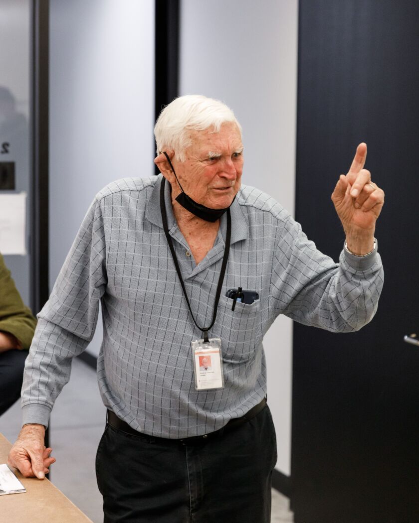 ArtCenter College of Design teacher Bob Schureman talks to students Monday during his last day on the Pasadena campus.