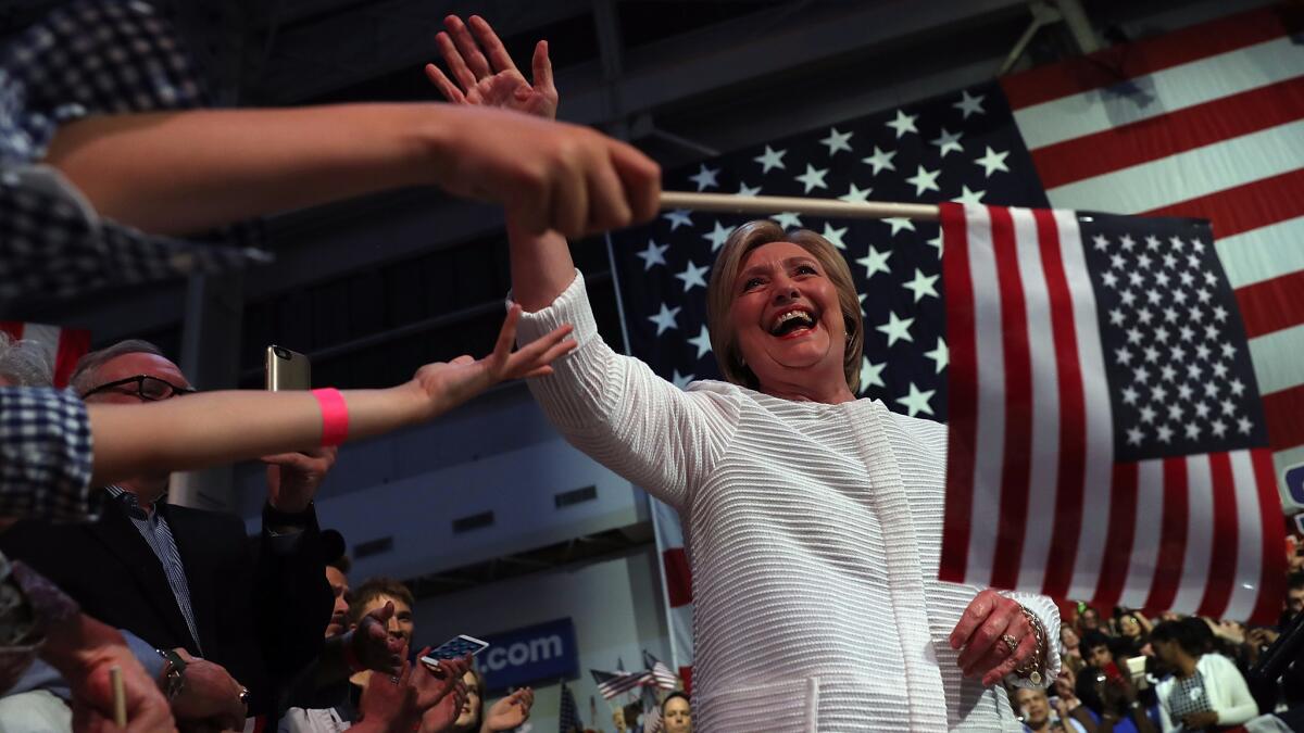Hillary Clinton greets supporters during a primary night event on June 7 in Brooklyn.