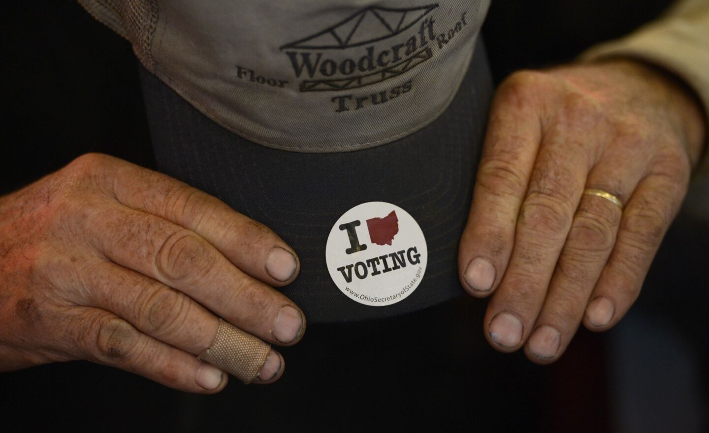 The hands of Sam Martin show off the sticker he received after voting early last week. Martin gathered with others on election day for breakfast in the Nutcracker Restaurant, a 1950s style diner in Pataskala, Ohio.