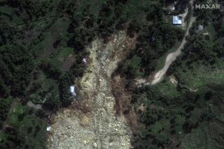 This May 27, 2024, satellite image provided by Maxar Technologies shows the recent landslide in the Enga region of northern Papua New Guinea that killed hundreds of people and buried part of the Yambali village. (Maxar Technologies via AP)