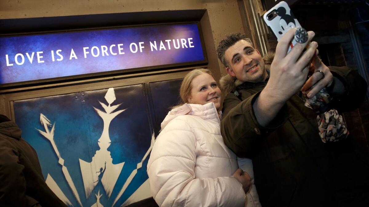 Megan and Jason Donahue of Long Island won a lottery for tickets to see "Frozen" on the first night of previews.