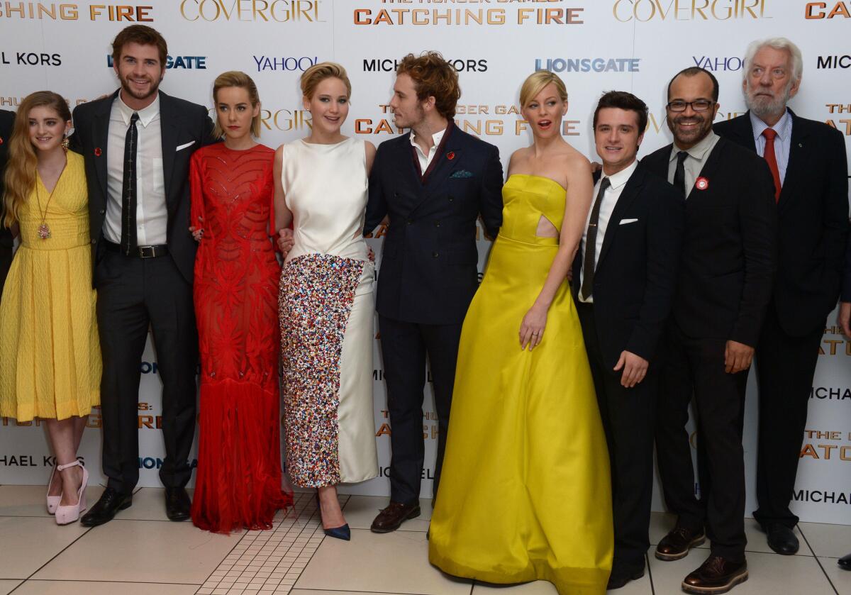 From left to right, Willow Shield, Liam Hemsworth, Jena Malone, Jennifer Lawrence, Sam Claflin, Elizabeth Banks, Josh Hutcherson, Jeffrey Wright and Donald Sutherland at the world premiere of "The Hunger Games: Catching Fire."