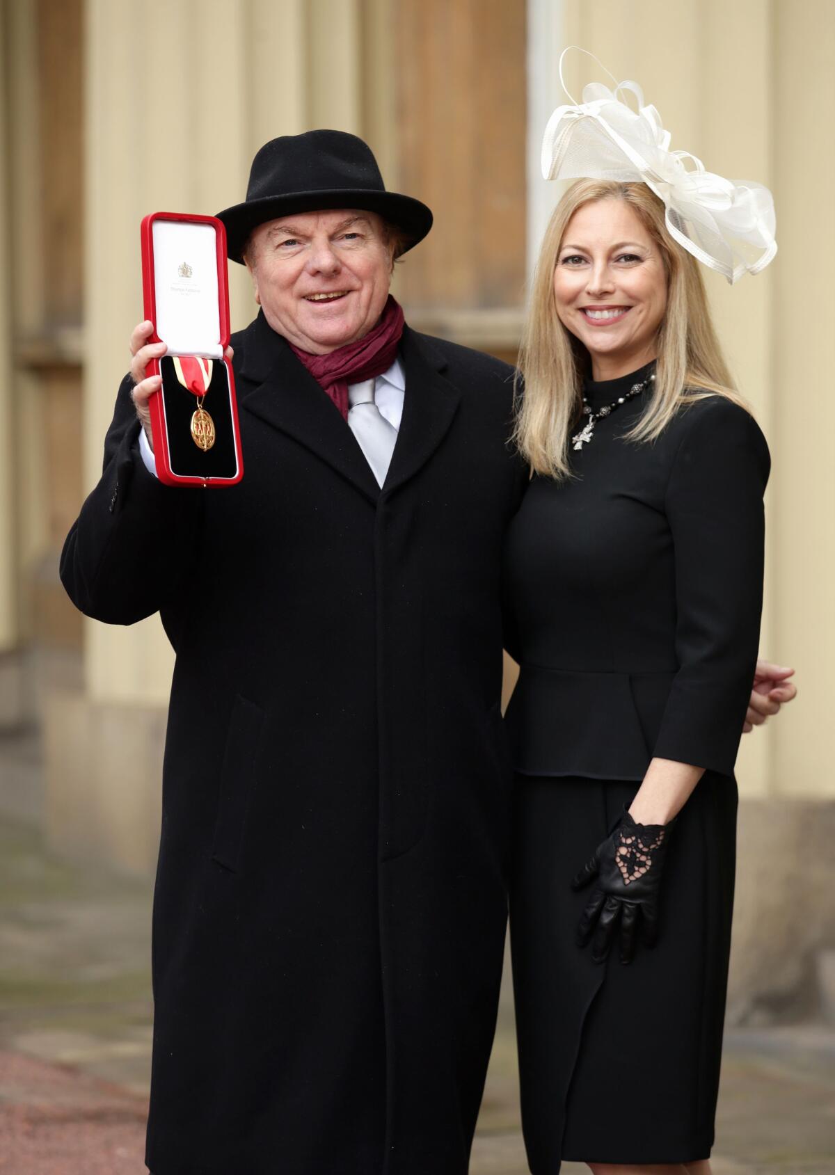 Van Morrison with his daughter Shana Morrison after he was knighted in 2016.