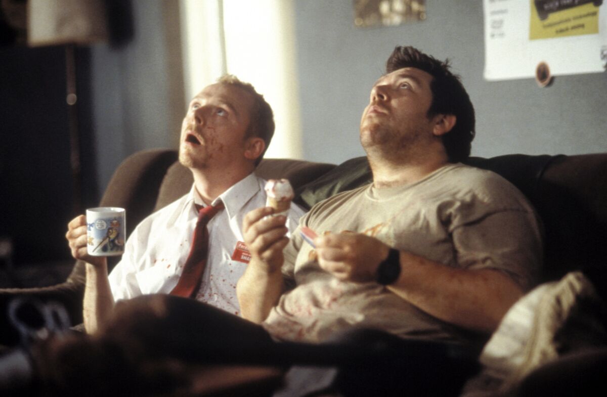 Simon Pegg (left) and Nick Frost (right) star in the movie SHAUN OF THE DEAD, a Rogue Pictures release.