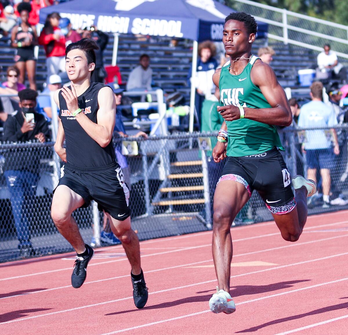 Dijon Stanley of Granada Hills (right) ran the second-fastest 400.