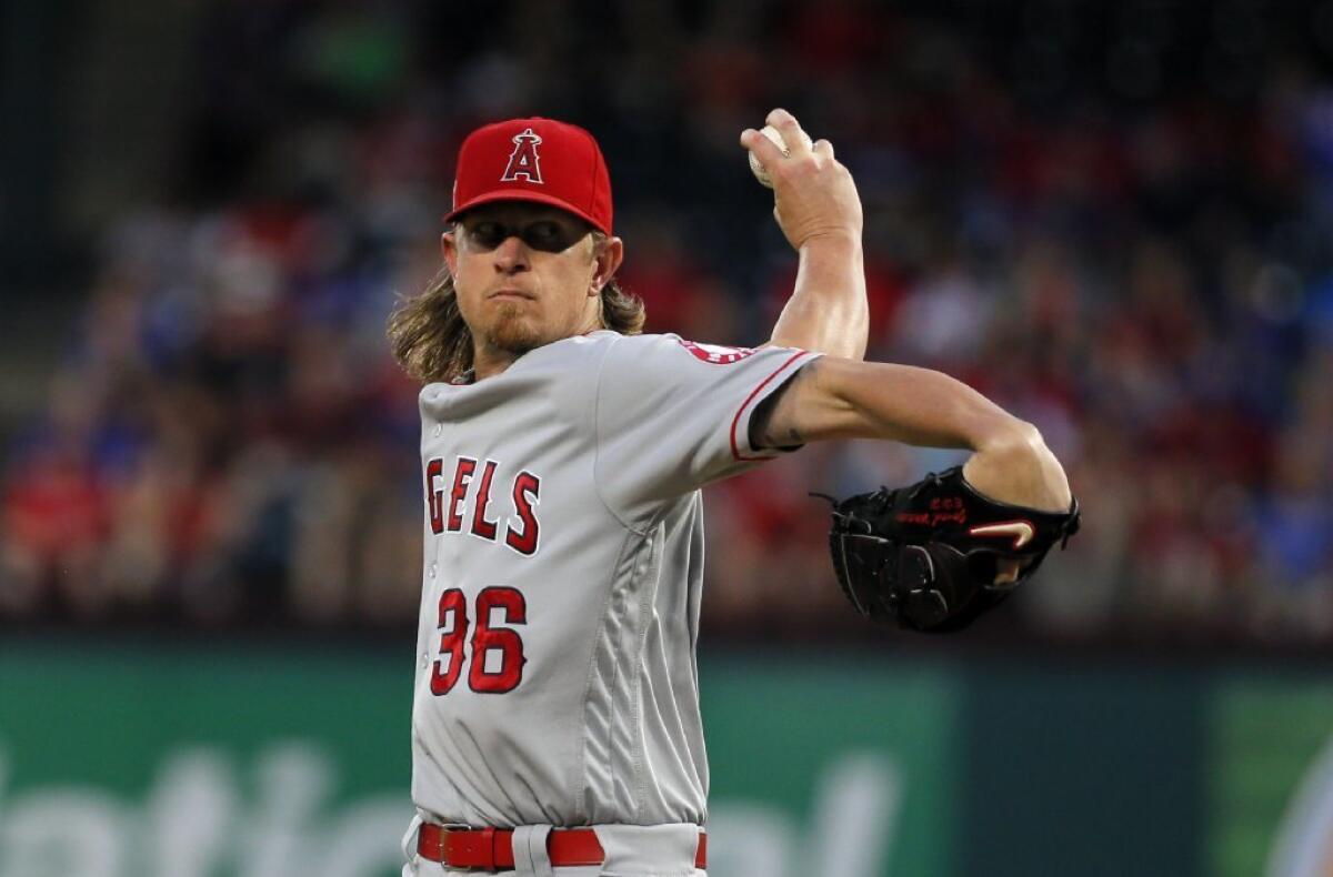 Angels starting pitcher Jered Weaver throws to the Texas Rangers in the first inning of a game on Sept. 21, 2016.