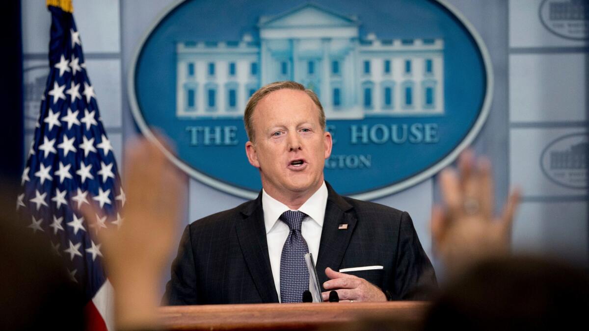 White House Press Secretary Sean Spicer departs after speaking to the media on May 30.