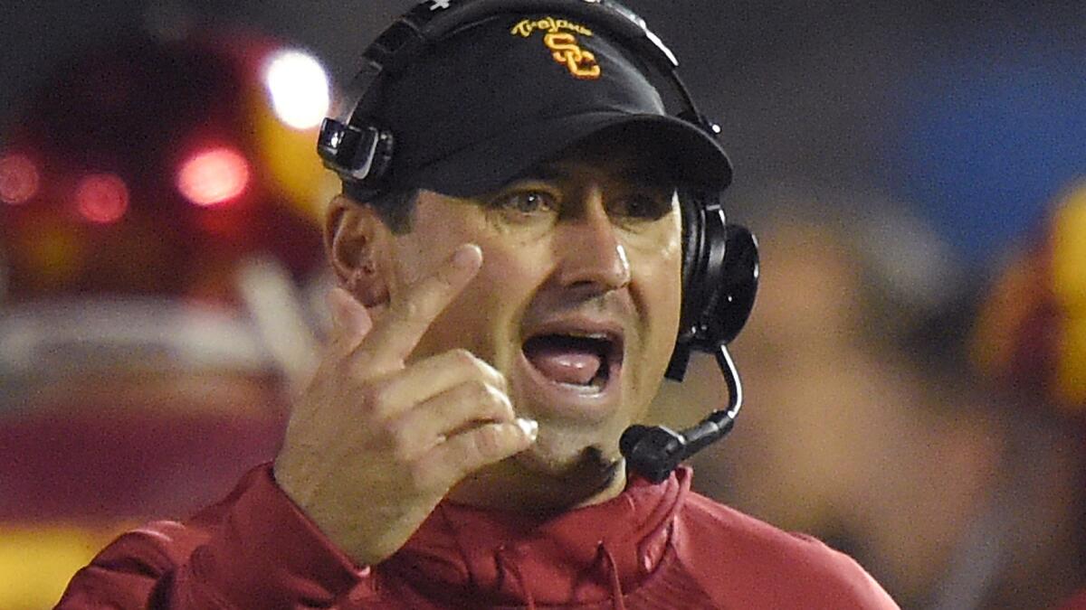 USC Coach Steve Sarkisian gestures during a game last season.