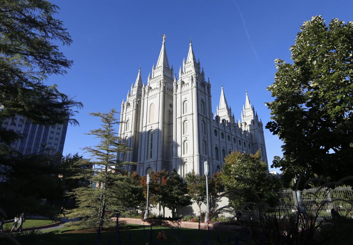 FILE - The Salt Lake Temple stands at Temple Square in Salt Lake City on Oct. 5, 2019. Merrill Nelson, a Utah lawmaker and prominent attorney for the Church of Jesus Christ of Latter-day Saints advised a church bishop not to report a confession of child sex abuse to authorities, a decision that allowed the abuse to continue for years, according to records filed in a 2021 lawsuit by three of Paul Adams’ children. (AP Photo/Rick Bowmer, File)