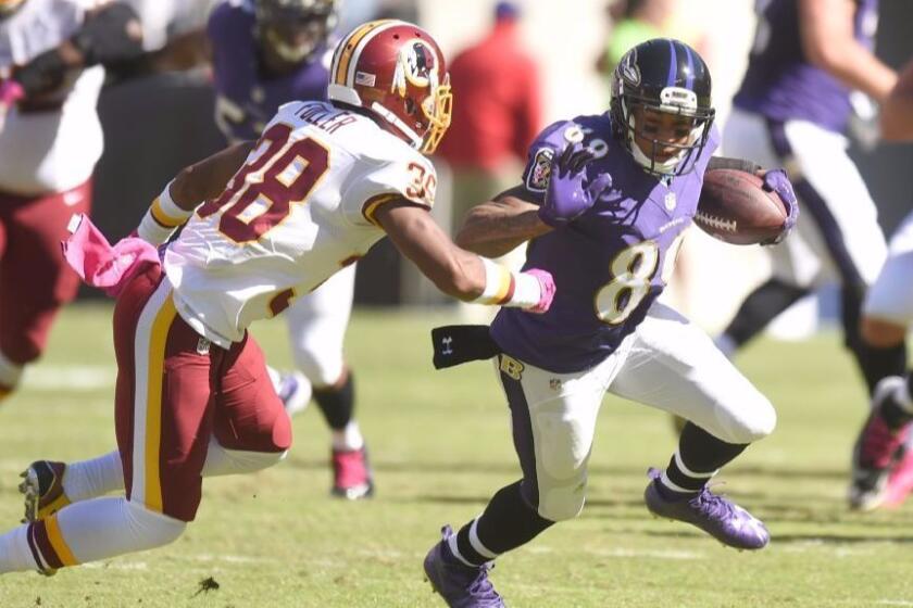 Ravens receiver Steve Smith Sr. tries to get around Redskins cornerback Kendall Fuller during the first quarter of a game on Oct. 9.