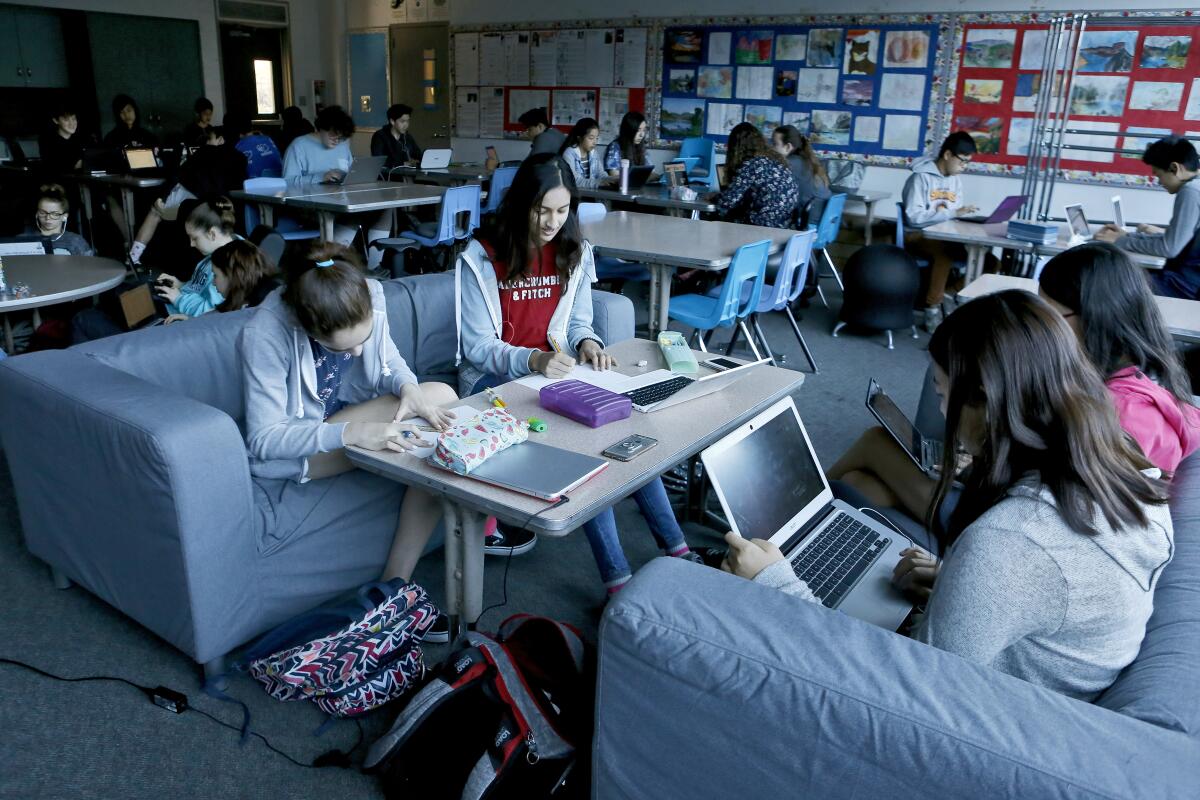 Three letters to the editor this week are in support of La Cañada Unified School District's Measure LC while another writer suggests voters take a closer look at the parcel tax measure. Above, La Cañada High School 7/8 students work on class projects in this file photo.