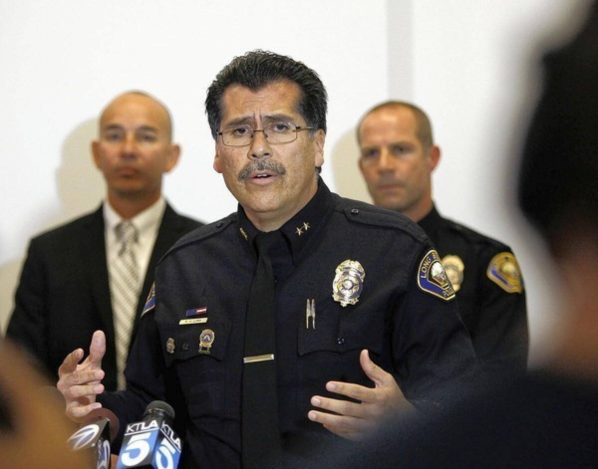 Deputy Chief Robert Luna of the Long Beach police speaks during a news conference announcing an arrest in the investigation of an attack with a fire bomb.