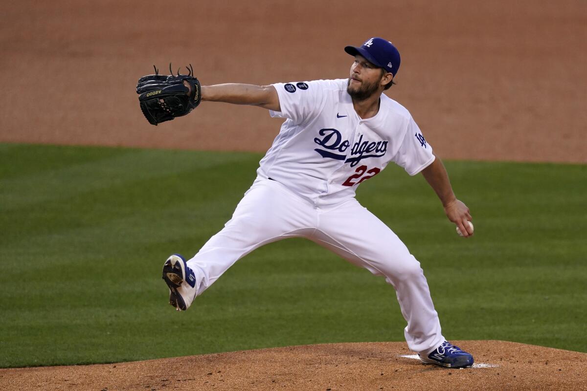 Los Angeles Dodgers starting pitcher Clayton Kershaw throws to the plate during the first inning.