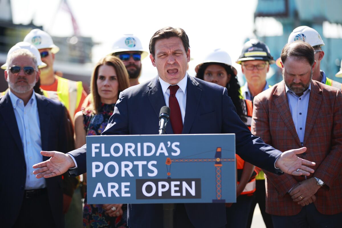 Florida Gov. Ron DeSantis speaks during a news conference, Friday, March 4, 2022 at Jacksonville Port Authority in Jacksonville, Fla. DeSantis announced that Sea Lead Shipping Pte. Ltd. would be joining operations at Jaxport. (Corey Perrine/The Florida Times-Union via AP)