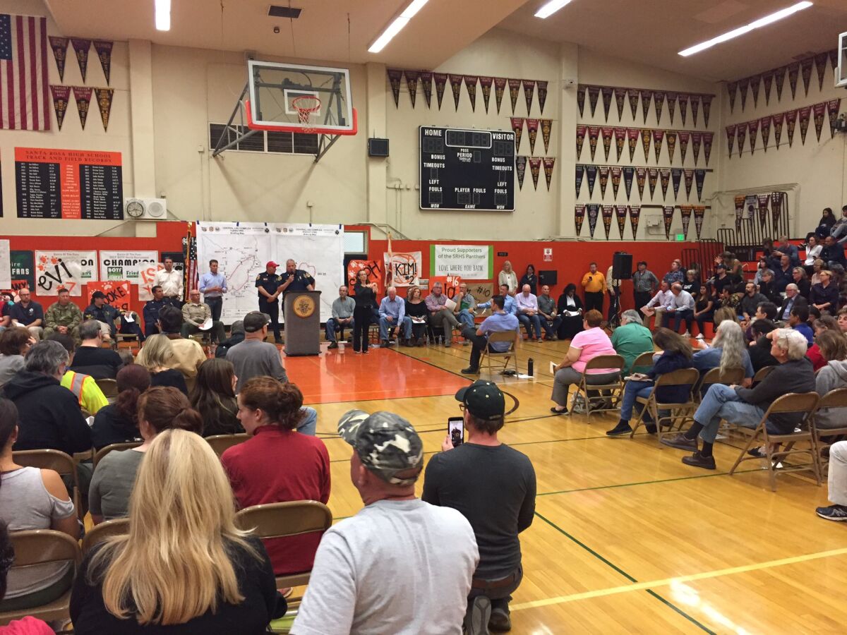 Sonoma County residents gathered inside the Santa Rosa High School gym Tuesday night to hear an update on the deadly wildfires in the region.