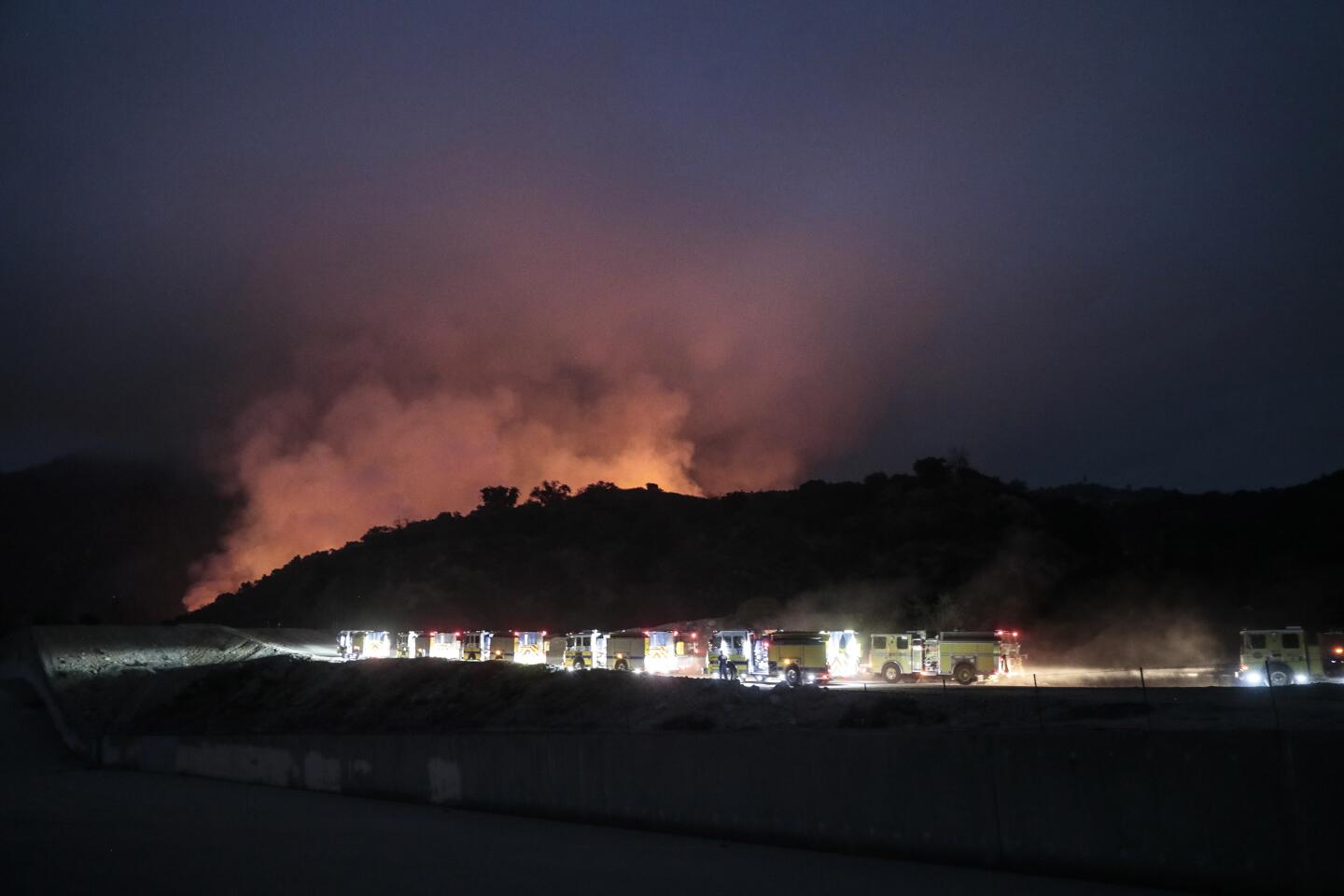 Fire engines head to the flaming Santa Anita Canyon as the Bobcat fire burns near Arcadia