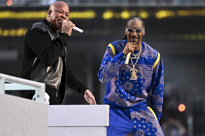 Inglewood, CA - February 13: Dr. Dre and Snoop Dogg perform during halftime in Super Bowl LVI at SoFi Stadium on Sunday, Feb. 13 2022 in Inglewood, CA. (Wally Skalij / Los Angeles Times)