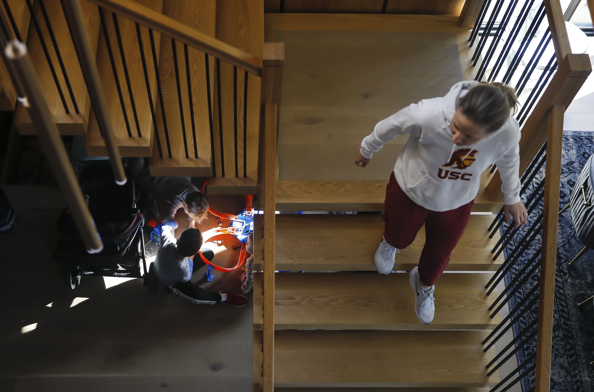 Lindsay Gottlieb gets ready to take her son Jordan to school as he plays with his cousin Jack.