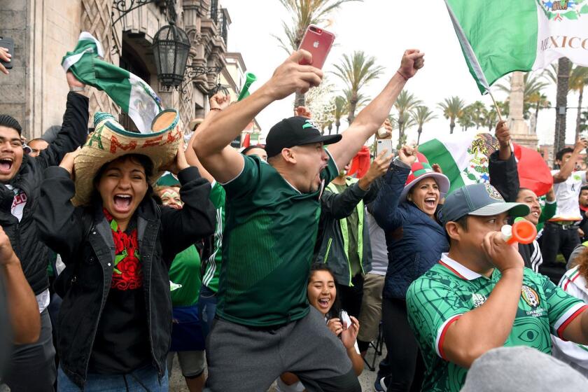 LOS ANGELES, CA - JUNE 23, 2018: Mexico fans react after a first-half goal by Mexico while watching the World Cup soccer match between Mexico and South Korea at Plaza Mexico in Lynwood. (Michael Owen Baker / For The Times)