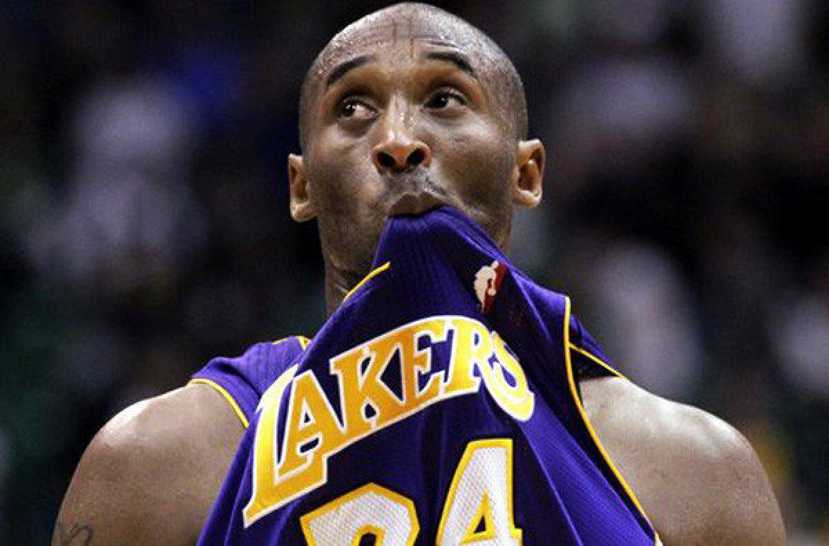 Lakers guard Kobe Bryant exits the court in the final seconds of a 95-86 loss to the Jazz on Wednesday night in Utah.