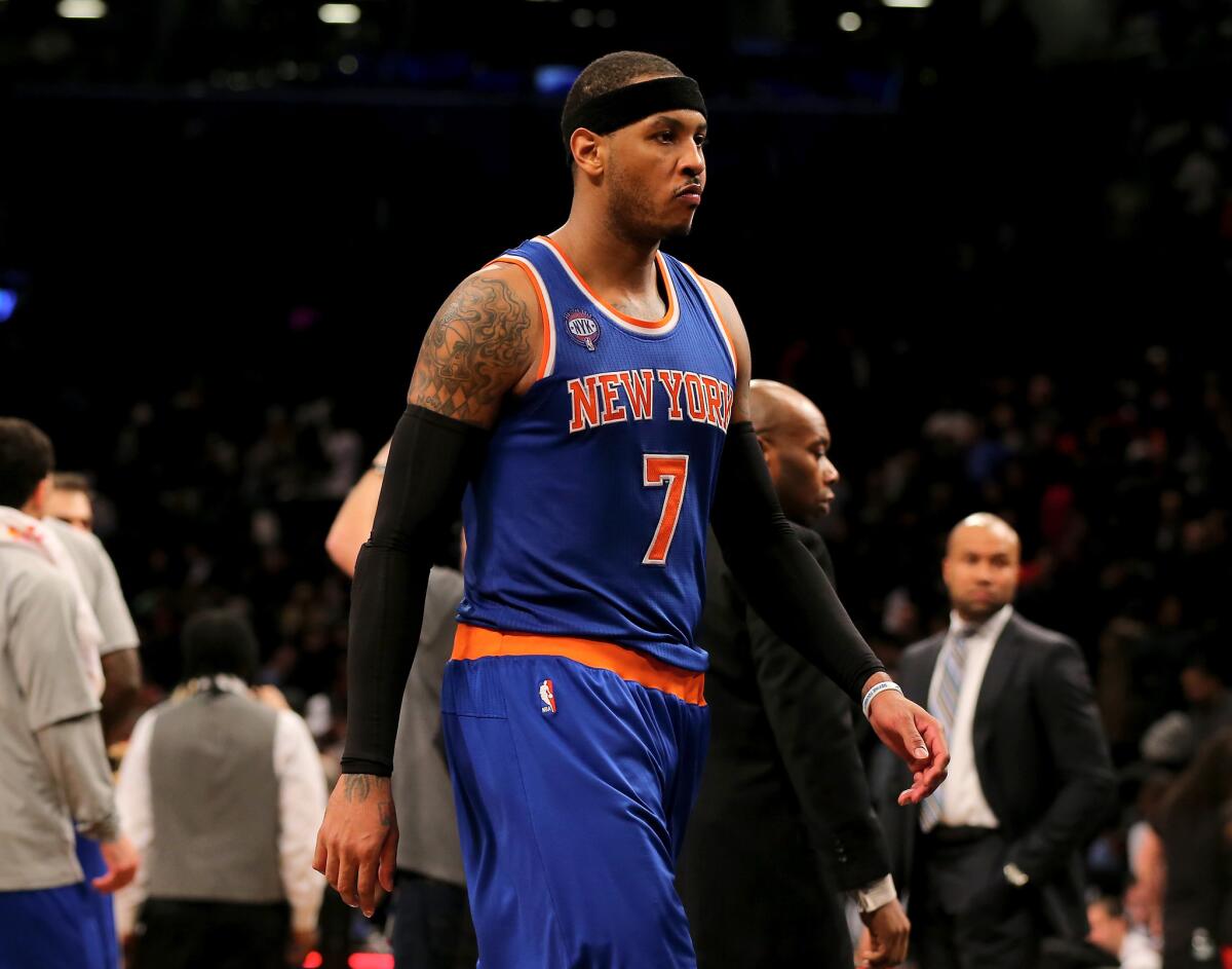 New York Knicks forward Carmelo Anthony walks off the court after a game against the Brooklyn Nets at Barclays Center on Feb. 6.
