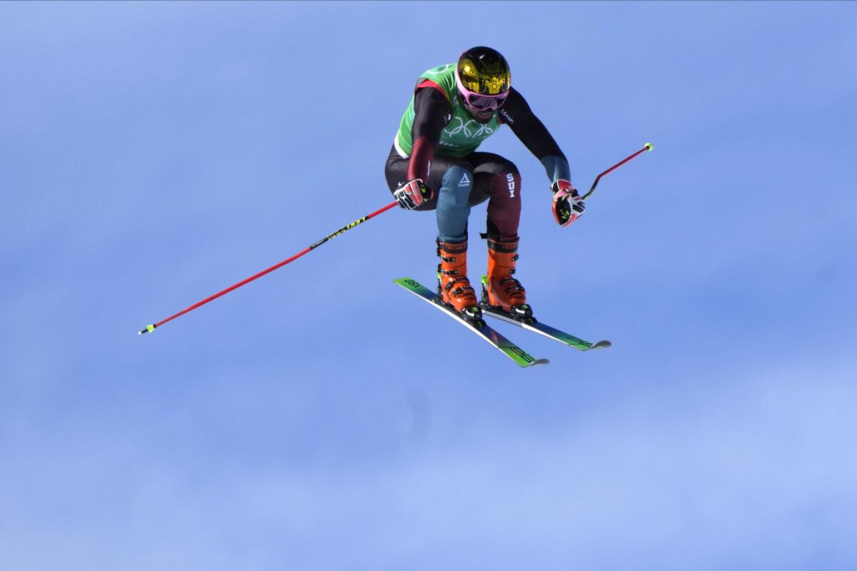 Switzerland's Ryan Regez competes during the men's skicross finals.