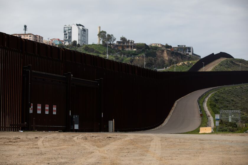 A 30-foot bollard-style wall seen at the U.S.-Mexico border, near the South Bay Water Reclamation Plant at San Diego, on Monday, Feb. 20, 2023. Similar 30-foot walls will be constructed at Friendship Park, a binational park at the U.S-Mexico border by the Pacific Ocean.