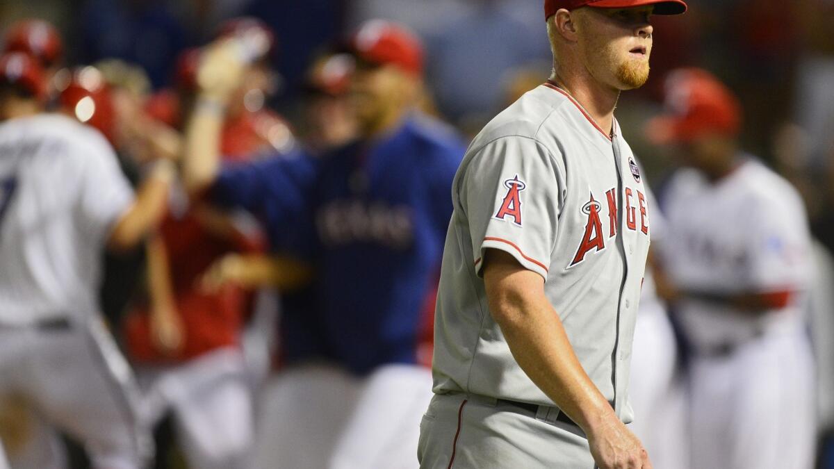 Angels lose to Texas Rangers, 14-11, on walk-off home run in 10th