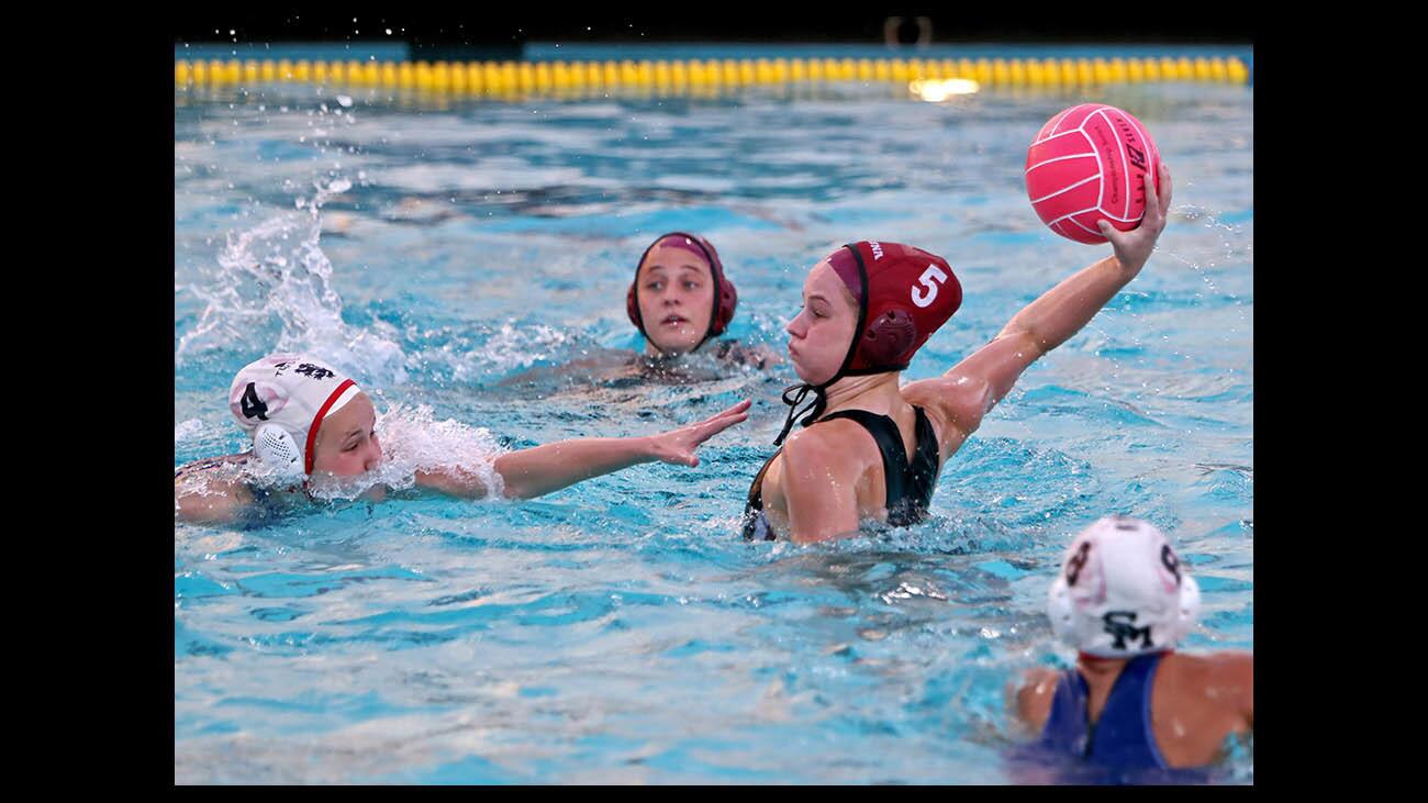 Laguna Beach High girl's water polo player #5 Rachel Carver scores the go-ahead goal in the 3rd place game vs. San Marcos High in overtime at the Santa Barbara Tournament of Champions, at Dos Pueblos High School in Goleta on Saturday, Jan. 12, 2019. LBHS won 10-8 in overtime.