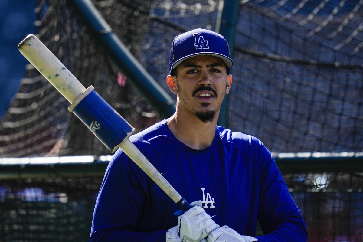 Dodgers second baseman Miguel Vargas (17) participates in batting practice before a baseball game.