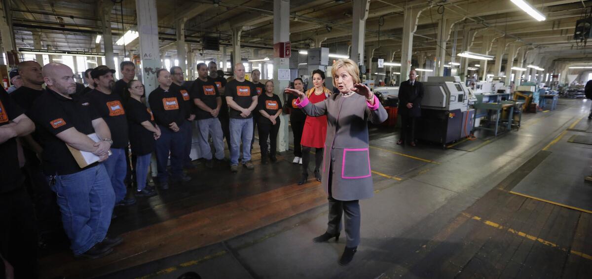 Democratic presidential candidate Hillary Clinton speaks to employees at WH Bagshaw, a 5th generation family owned business in Nashua, N.H.