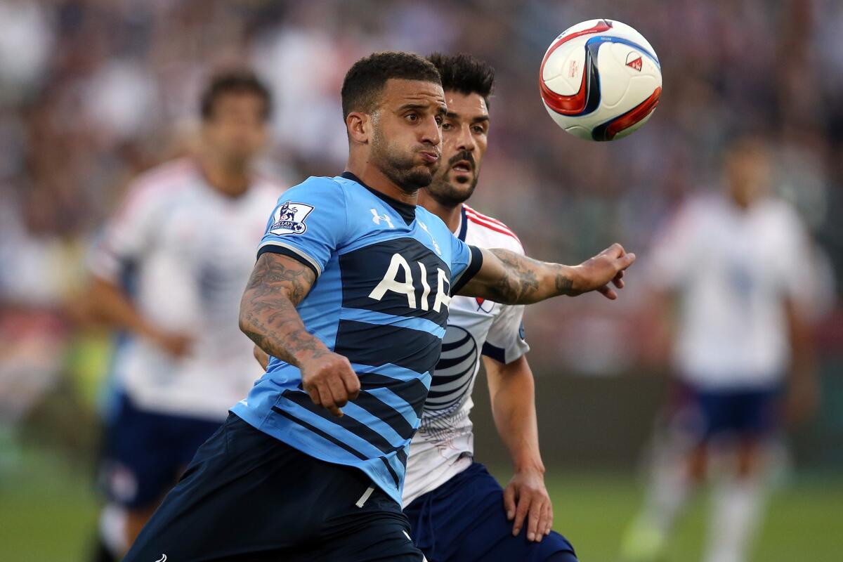 Tottenham's Kyle Walker looks to control the ball against David Villa of the MLS All-Stars during a game in Commerce City, Colo. on Wednesday night.