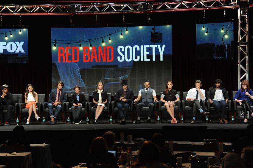 On stage during the "Red Band Society" panel on Sunday are, from left, Astro, Ciara Bravo, Nolan Sotillo, Griffin Gluck, Zoe Levin, Charlie Rowe, Wilson Cruz, Rebecca Rittenhouse, Dave Annable, Octavia Spencer and writer/executive producer Margaret Nagle.