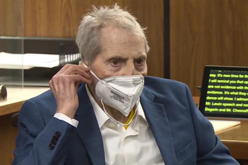 FILE - In this still image taken from the Law&Crime Network court video, real estate heir Robert Durst watches as his defense attorney Dick DeGuerin presents a new round of opening statements in the murder case against Durst after a 14-month recess due to the coronavirus pandemic in Los Angeles County Superior Court in Inglewood, Calif., on Wednesday, May 19, 2021. Durst, 78, an heir to a New York commercial real estate empire, is charged with first-degree murder in the slaying of his best friend, Susan Berman. A judge on Monday, June 14 has ordered that the trial of Durst will continue, despite defense requests for a delay because he's in too much pain. Durst was hospitalized and the trial was put on pause Thursday, June 10. (Law&Crime Network via AP, Pool, File)