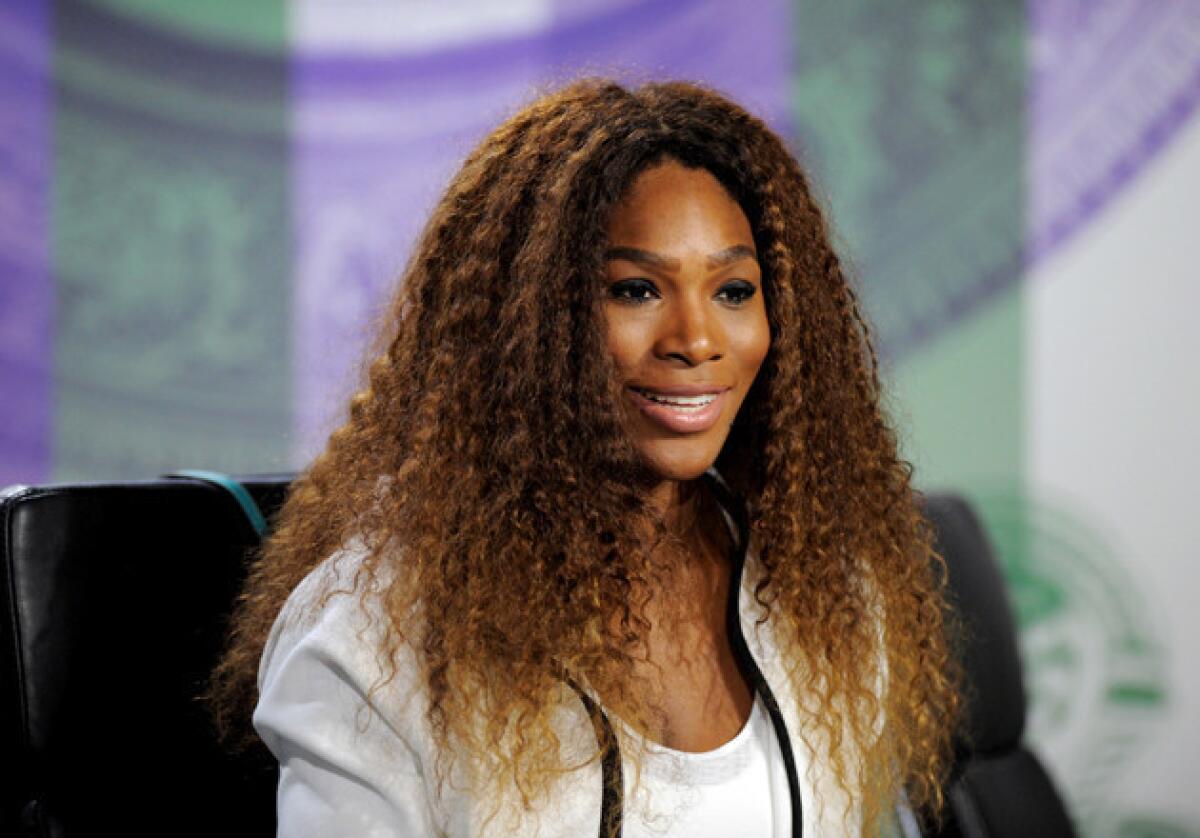 Serena Williams talks to the media during previews at Wimbledon.