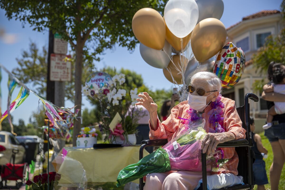 How do you celebrate your 102nd birthday during a pandemic? For Millie Stratton, who turned 102 on Wednesday, it meant a parade past her home led by the Alhambra police and fire departments. Her advice for longevity: "Well, it's easy to say: You have to live each day without the stress." Times photographers are capturing California's gradual reopening in photos, from Zoom graduations to creative tributes to medical workers.