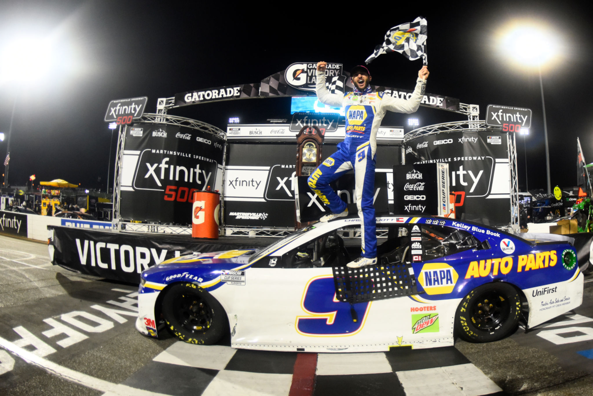Chase Elliott celebrates in victory lane after winning Sunday's NASCAR Cup race at Martinsville Speedway.