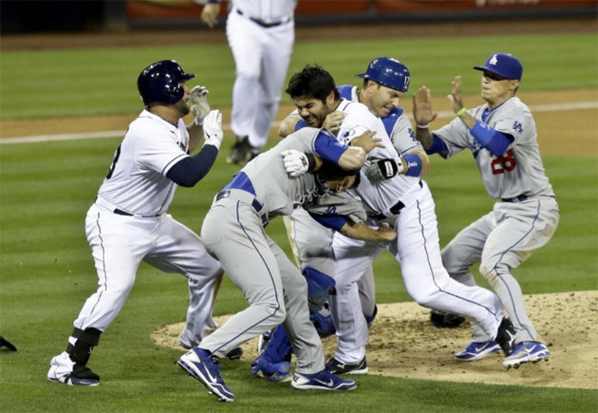 San Diego Padres and Dodgers players brawl after Padres outfielder Carlos Quentin charged the mound.