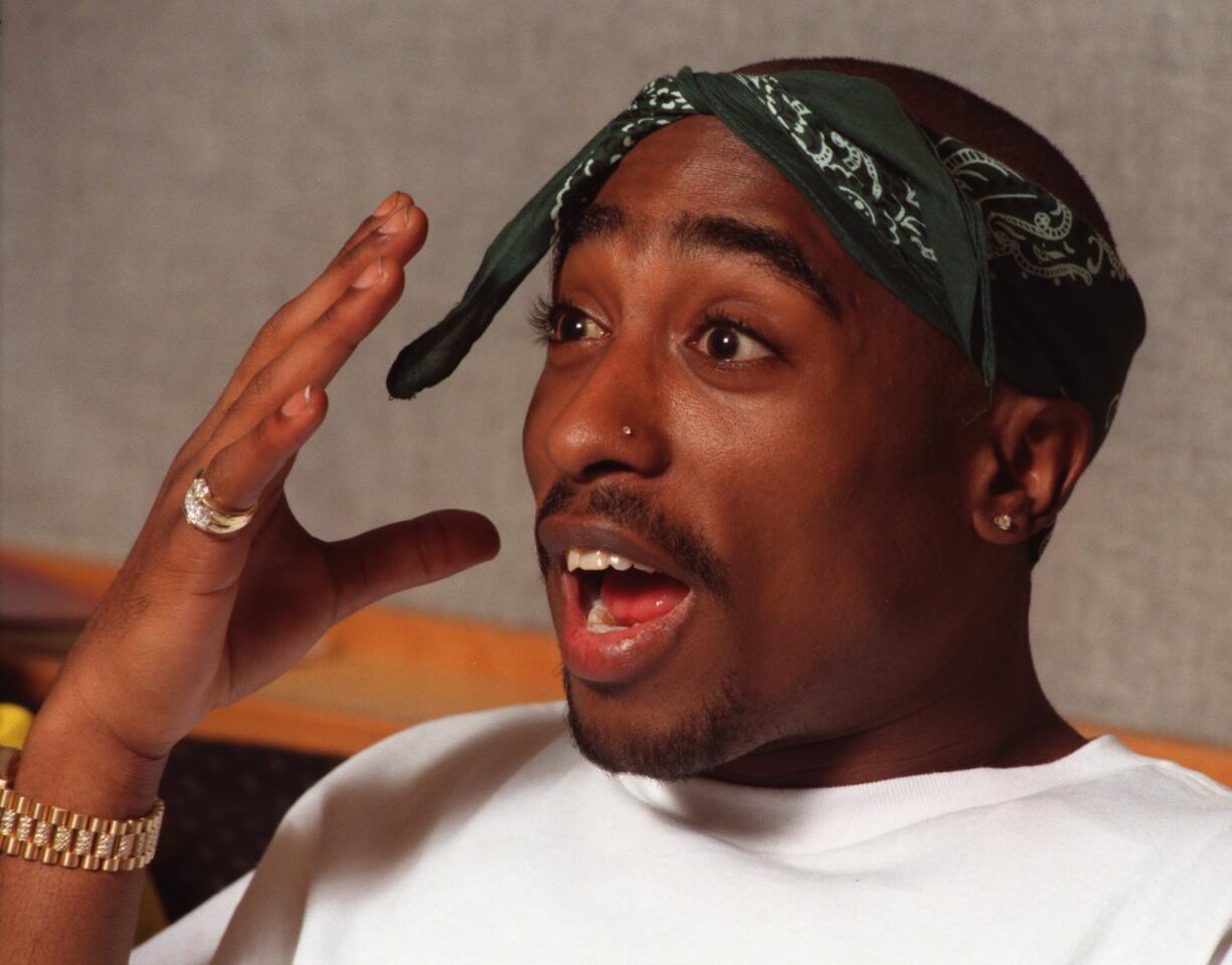 The death of rapper-actor Tupac Shakur, shown in 1995, is still considered a mystery and a tragic milestone in music.