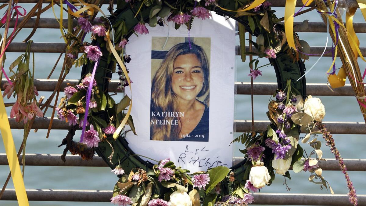 Flowers and a portrait of Kathryn Steinle at Pier 14 in San Francisco in 2015.