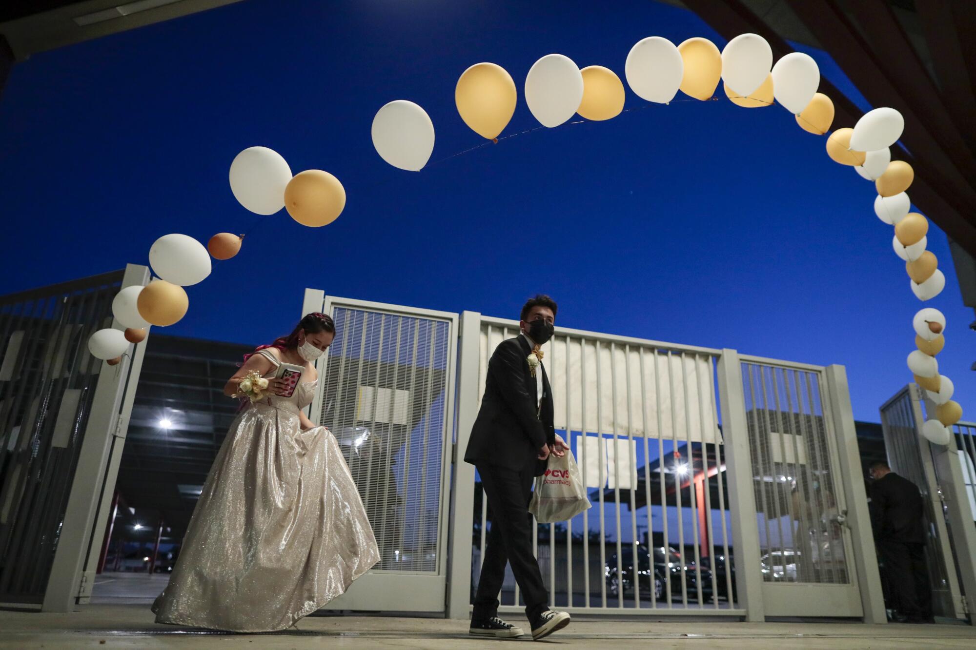 Jade Magallanes and her boyfriend, Jose Gonzalez, arrive at Sierra Vista for prom.