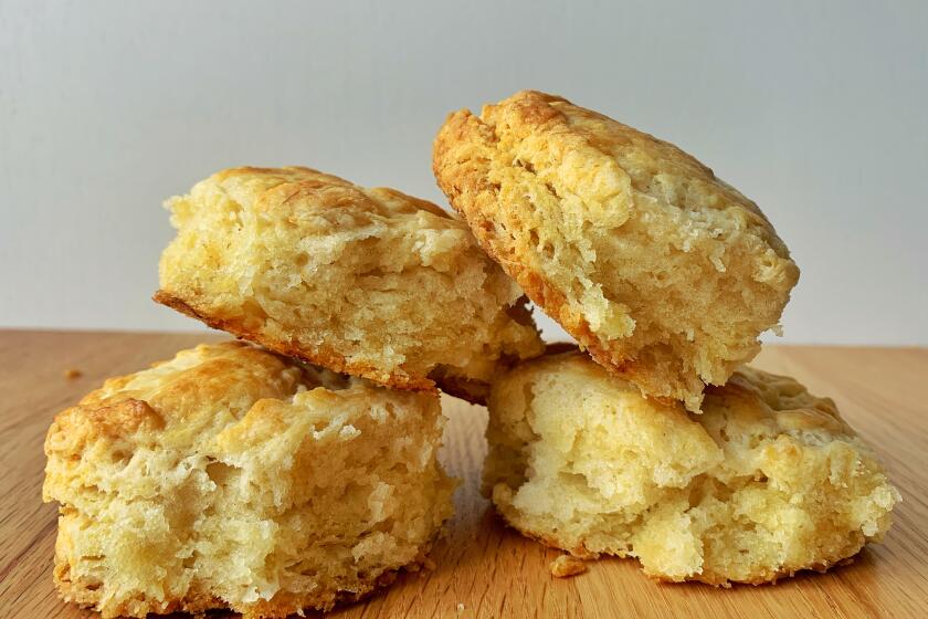 Flaky buttermilk biscuits are the perfect treat to keep in your freezer for lazy weekend breakfasts.
