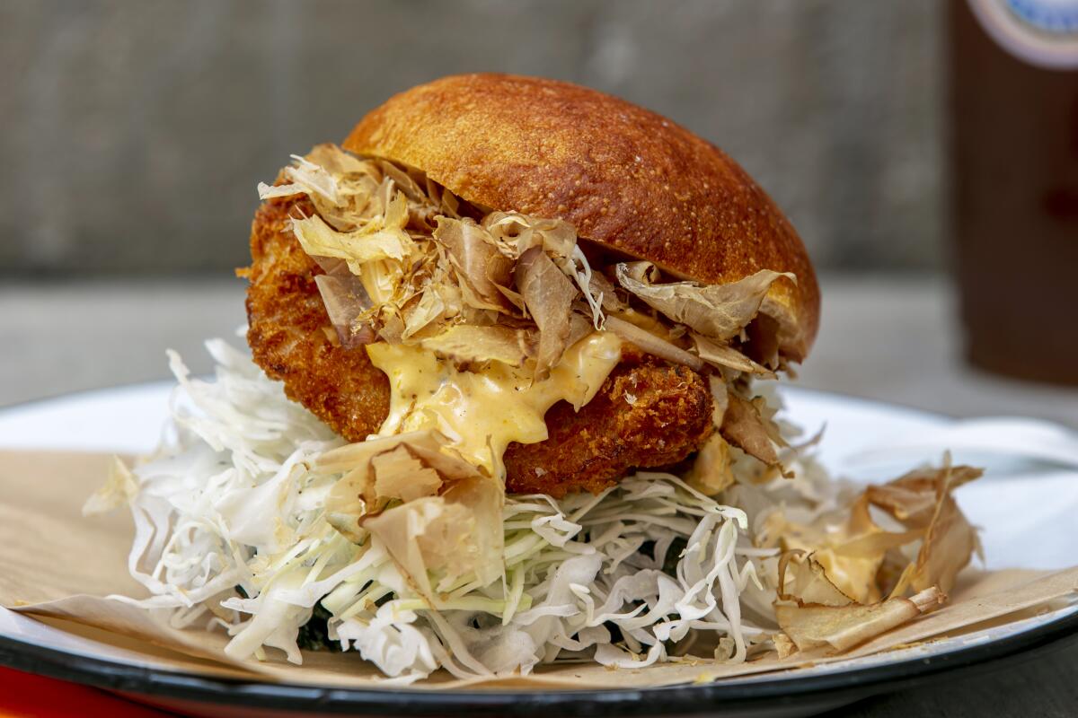 A fish katsu sandwich with slaw and bonito flakes from Yess Aquatic.