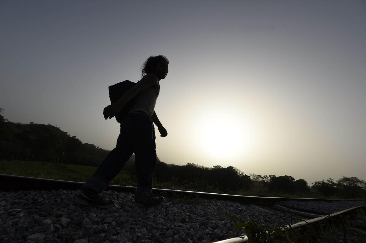 A migrant walks in Chiapas state, Mexico, in June 2015. Hundreds of Central American migrants enter Mexico on their way to the United States.