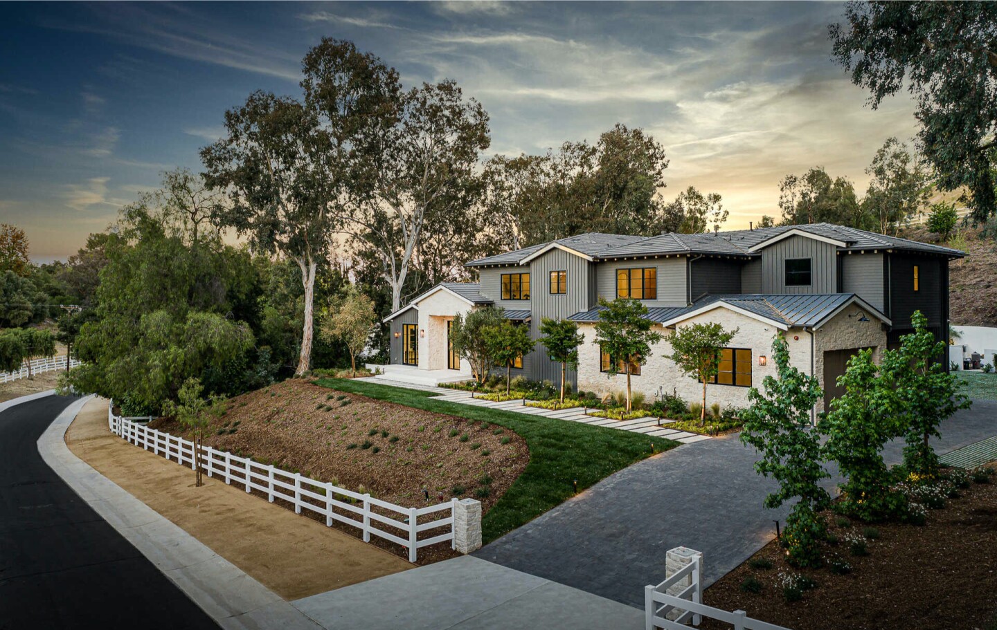 Built in 2020, the amenity-loaded home spans nearly 10,000 square feet with six bedrooms, 7.5 bathrooms, a movie theater, wine cellar and gym.