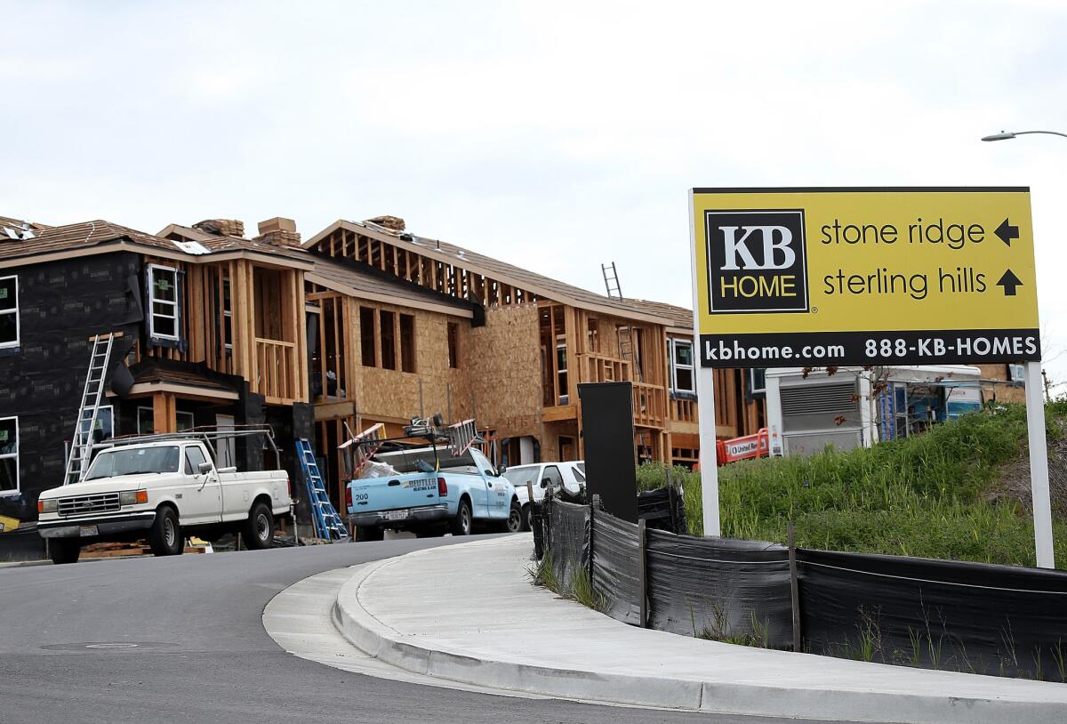 Houses by KB Home are seen under construction in Petaluma, Calif., in 2013.