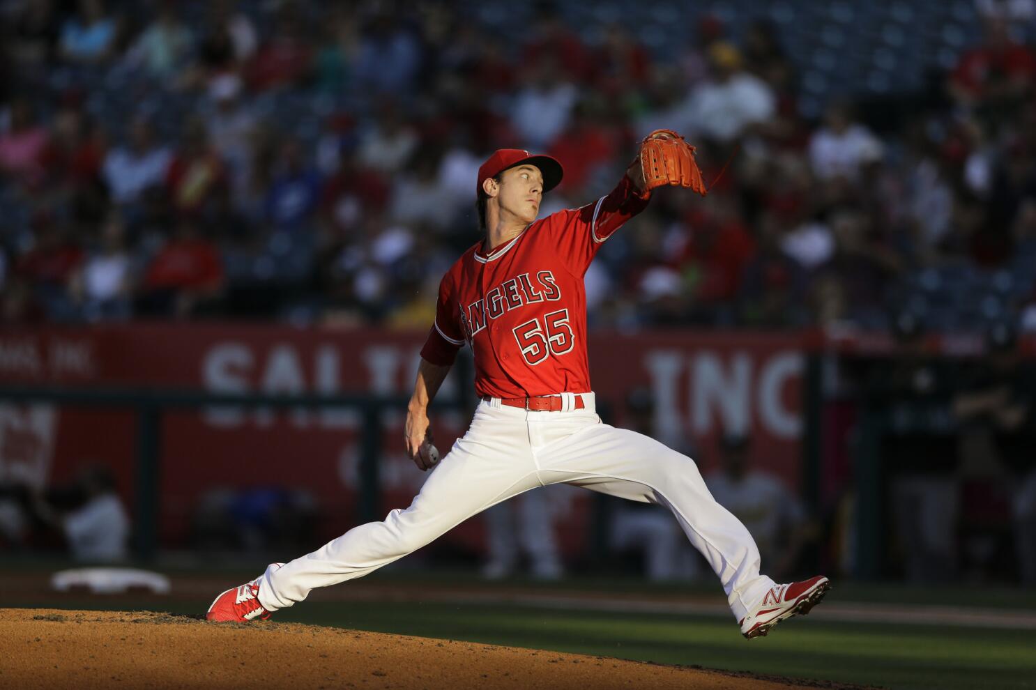Los Angeles Angels pitcher Tim Lincecum throws to the Oakland